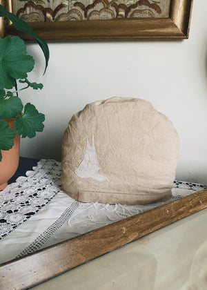 Hand embroidered linen tea-cosy